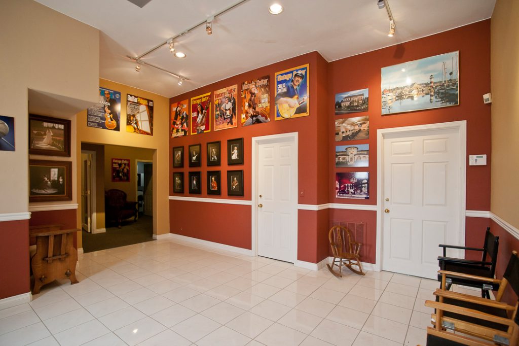 Reception and Lobby Area with many colorful photographs at San Diego Photography Studio