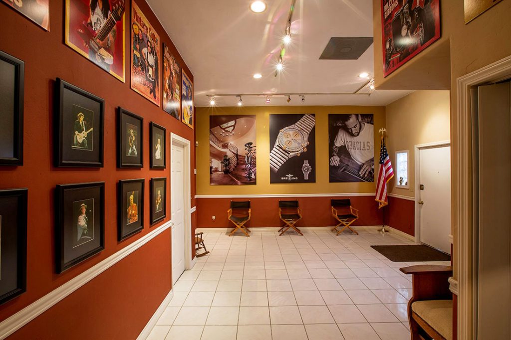 Lobby and Reception Area with photos and posters at San Diego Photo Studio Rental